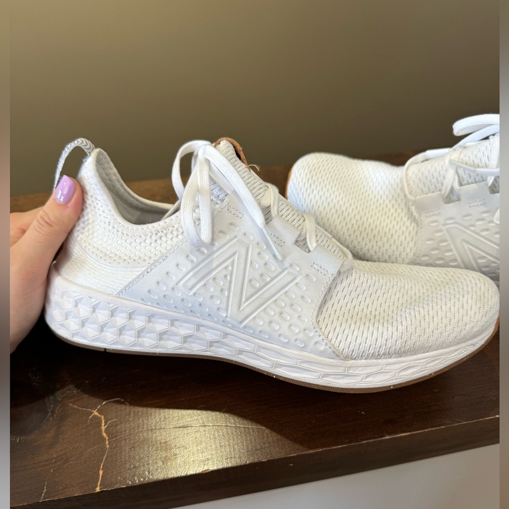 white New Balances size 10